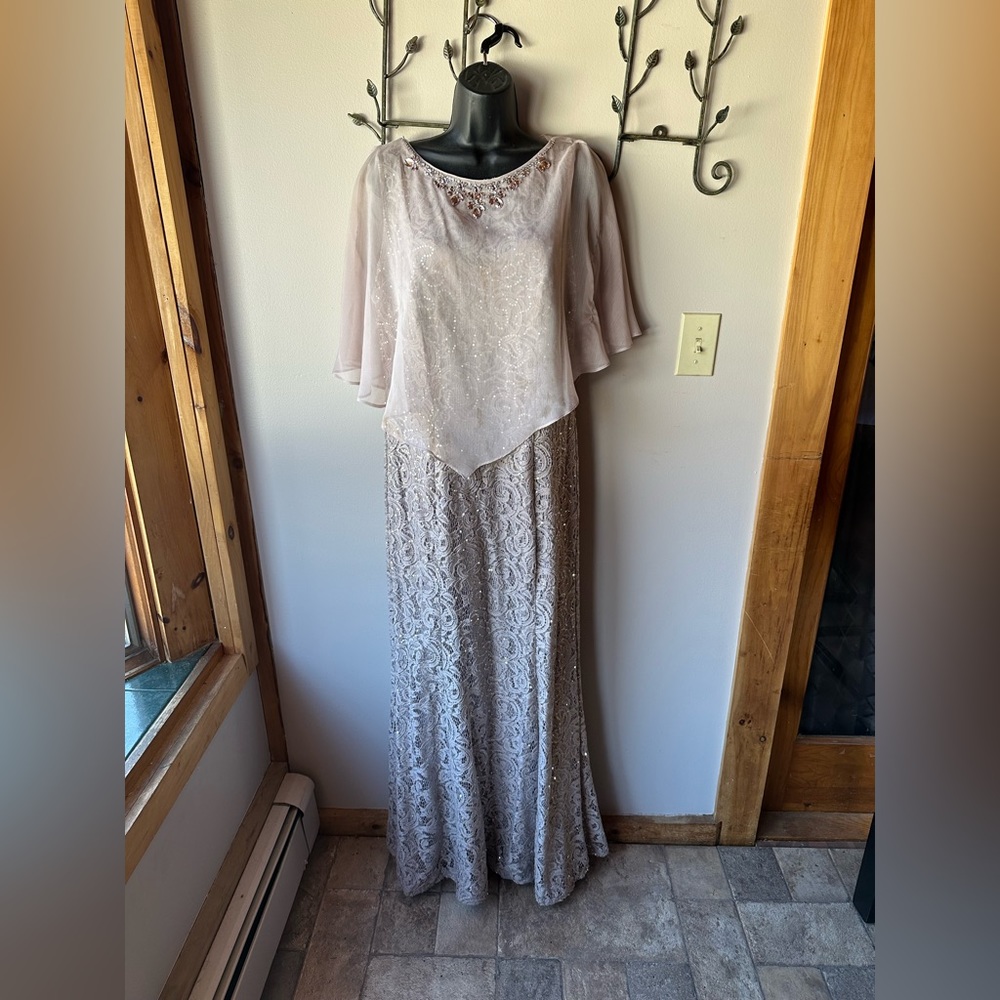 Beautiful formal gown. Trumpet shape with chiffon caplet.